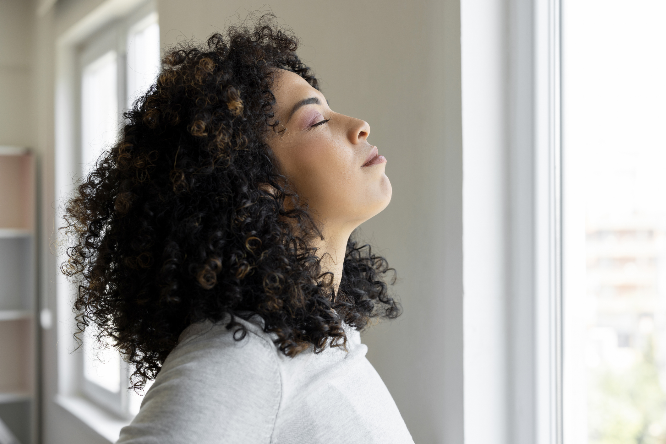 Young woman relaxing breathing fresh air