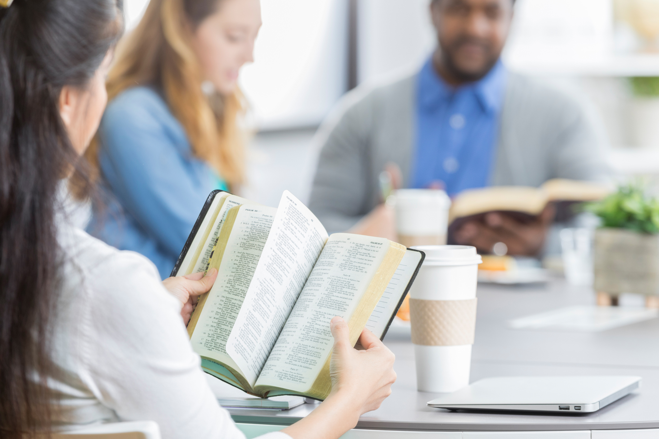 Group of people participate in Bible study